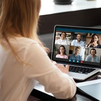 Woman on laptop video conference call.